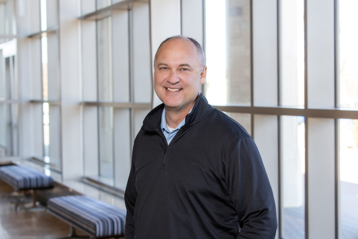 Headshot of Justin Miller  Ma  Ms in a Hallway